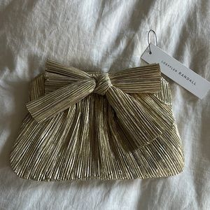 Loeffler Randall metallic clutch purse.